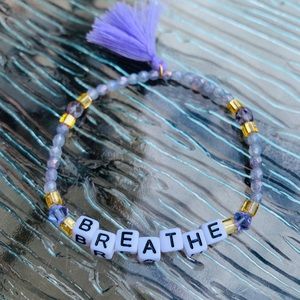 Breathe elastic cord bracelet